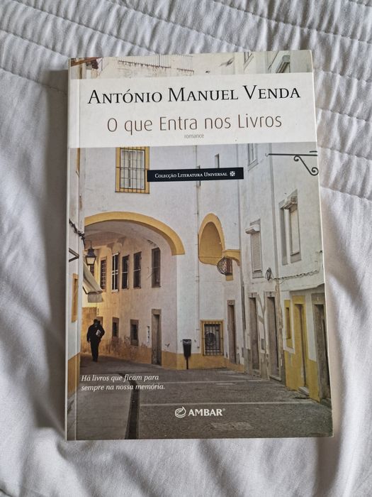 O que nos entra nos livros de António Manuel Venda Editora Ambar