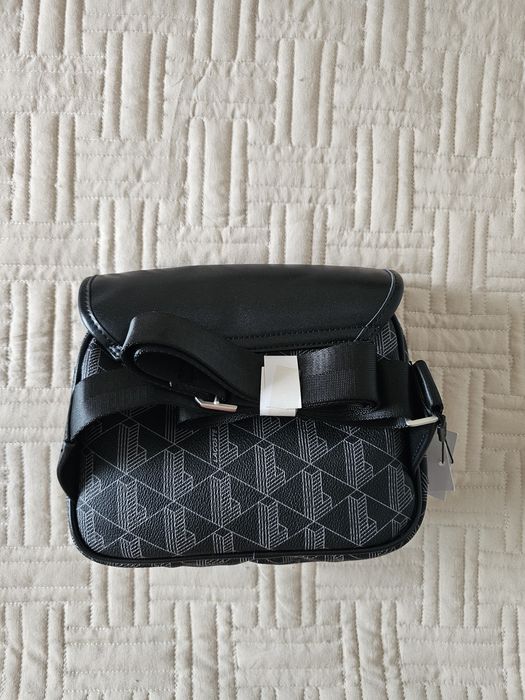 Bolsa tira colo lacoste novo com etiqueta e embalagem