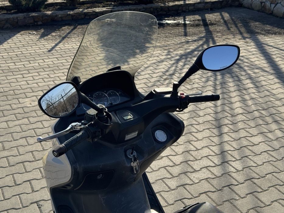 Мотоцикл Kymco Xciting