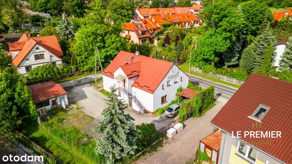 Dom z lokalem usługowym i magazynem – Małomicka