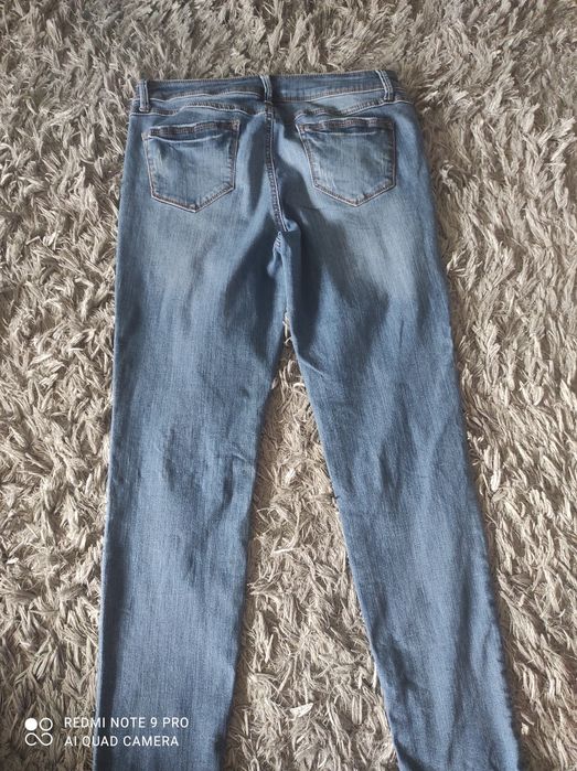 Spodnie dżinsowe " porwane"