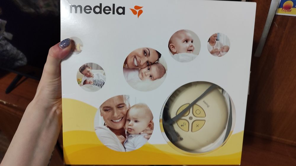 Молокоотсос молоковідсмоктувач електричний Medela swing+ система Кальм