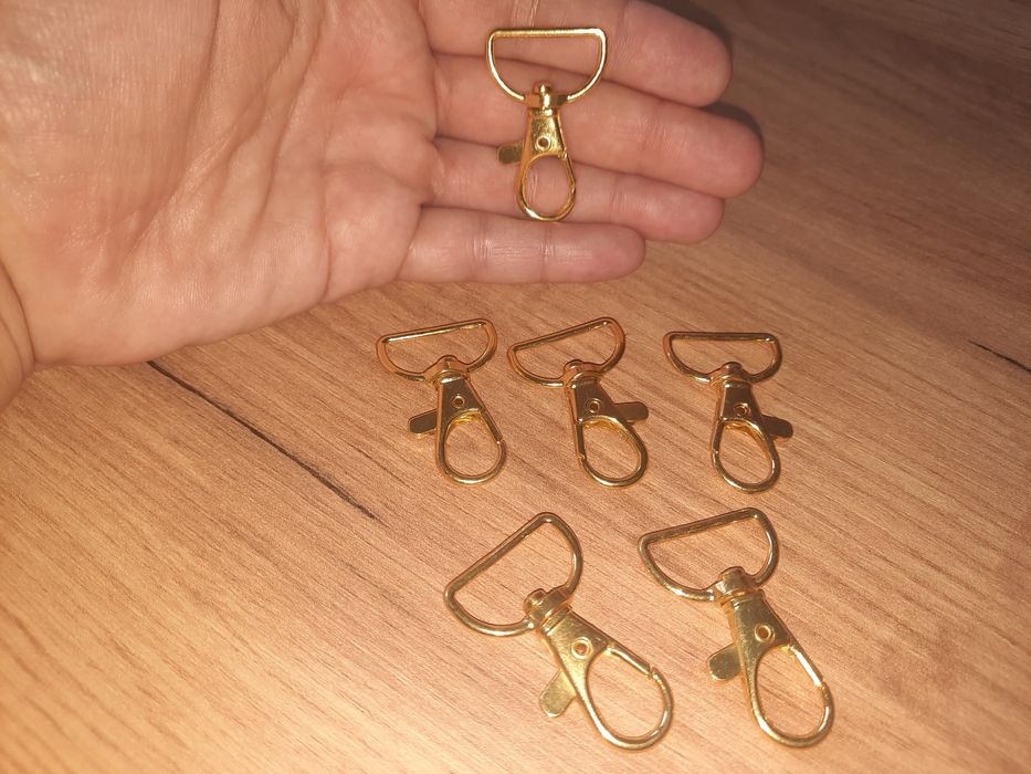 Złote, obrotowe klamry do torebki