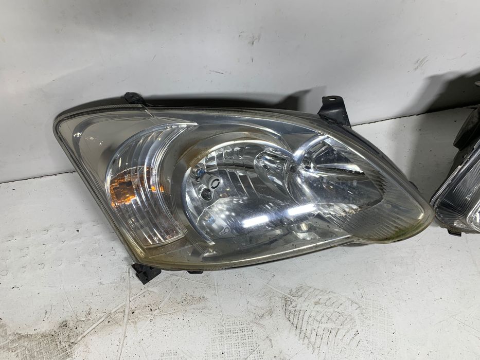 Prawy Lewy reflektor lampa EUROPA lampy przód toyota corolla E12 2006r