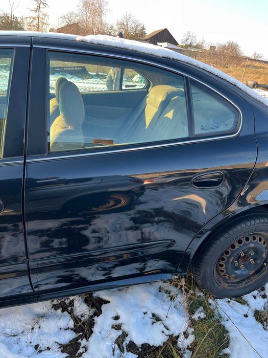 Drzwi tył tylnie lewe prawe Chevrolet Alero Oldsmobile