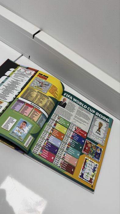 Caderneta mundial 2026 (capa dura), versao dourada