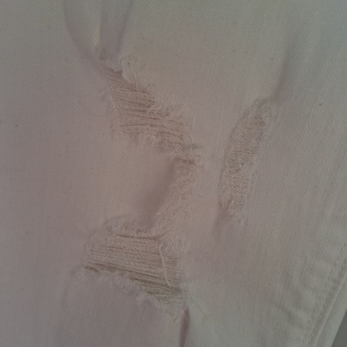 Jeansy białe Monnari