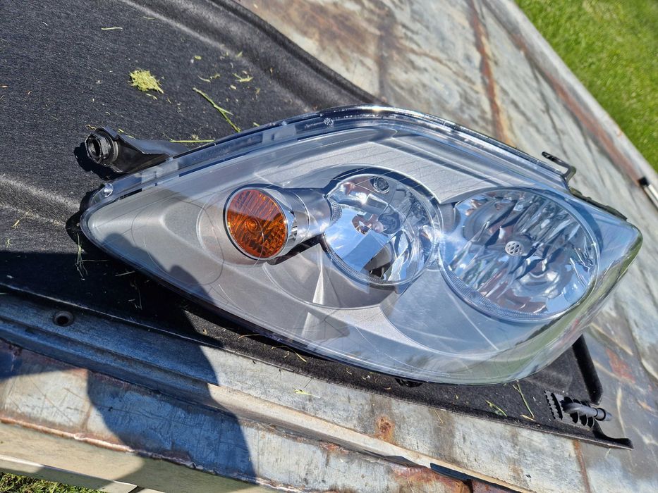 VW Golf + PLUS reflektor HELLA NOWY ORG