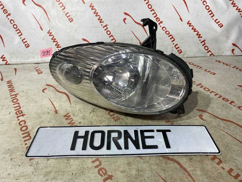 Фара передняя правая Nissan Micra K-12