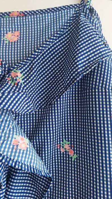 Bluzka na ramiączkach biało niebieska z kwiatami Takko Fashion 38 fa