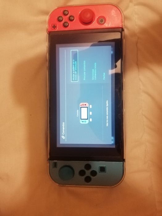 Nintendo Switch with Two Games, Charger, and Carrying Case64738628946051122