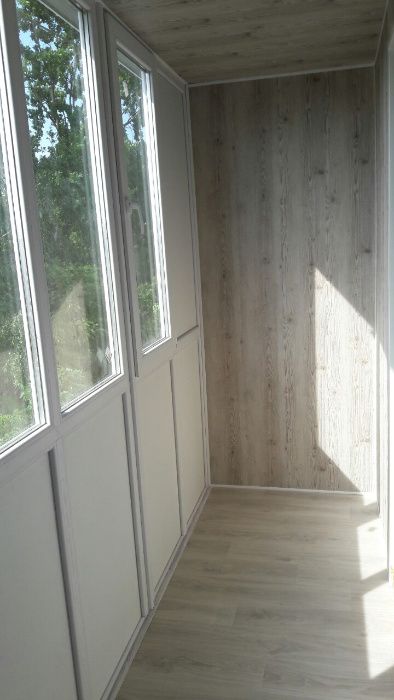 Балкони. Встановлення балконних вікон. Обшивка та утеплення балконів.