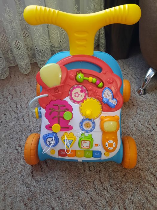 Дитяча каталка-ходунки з ігровою панеллю. Ходунки зі звуковими ефектам