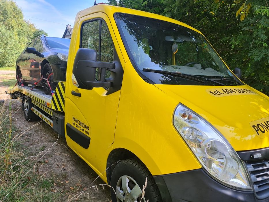 Pomoc drogowa-usługi transportowe lawetą-holowanie