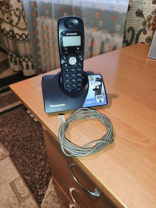 Кнопочный стационарный телефон