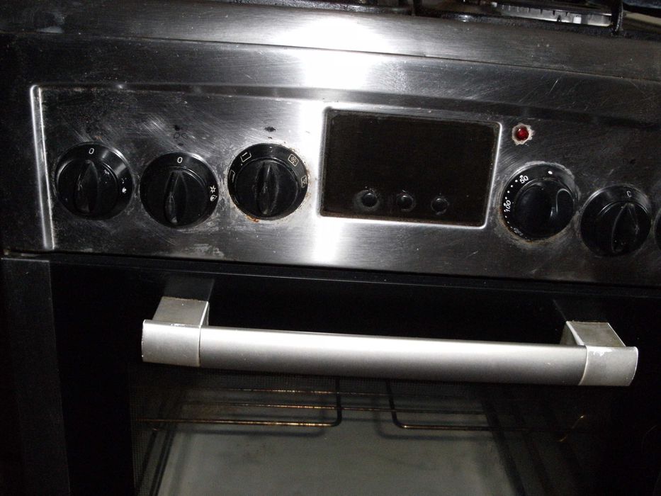 Kuchenka gazowo elektryczna- srebrna używana