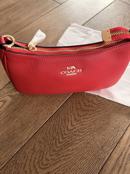 Elegancka torebka Coach – skórzana, z dwoma paskami