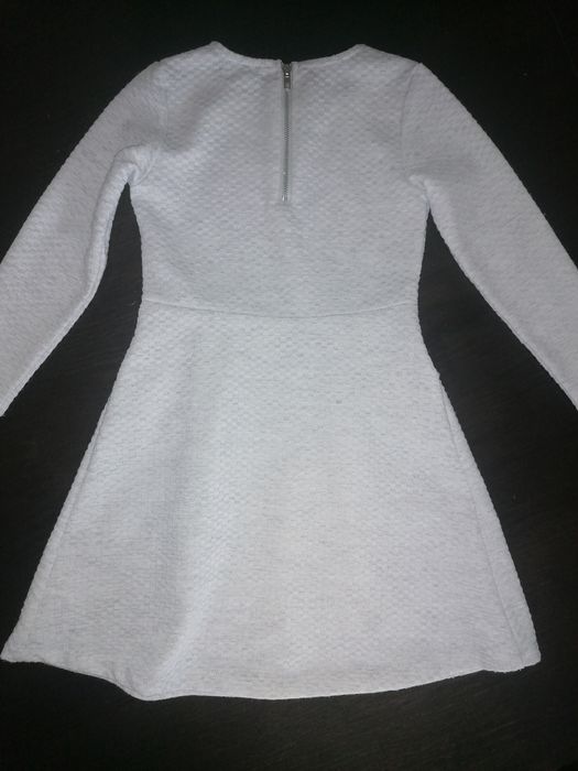 Sukienka z kieszeniami r. 104