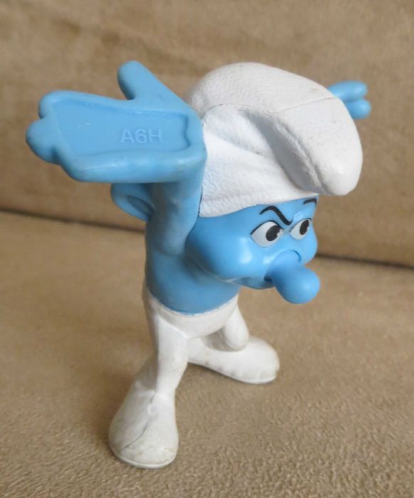 Brinquedos  Boneco Smurfs + oferta Filme DVD Super Heróis O Filme