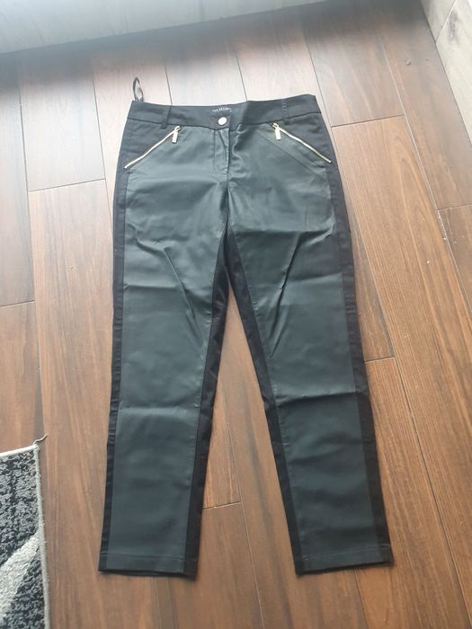 Sprzedam nowe bardzo eleganckie spodnie Top Secret 38