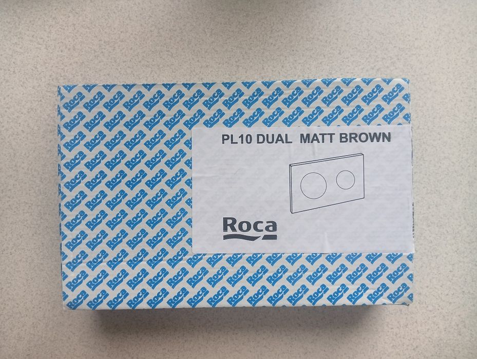 Przycisk do WC spłuczki Roca brązowy caffe nowa