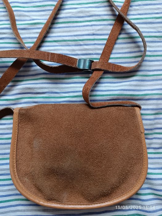Mala pequena em pele rústica