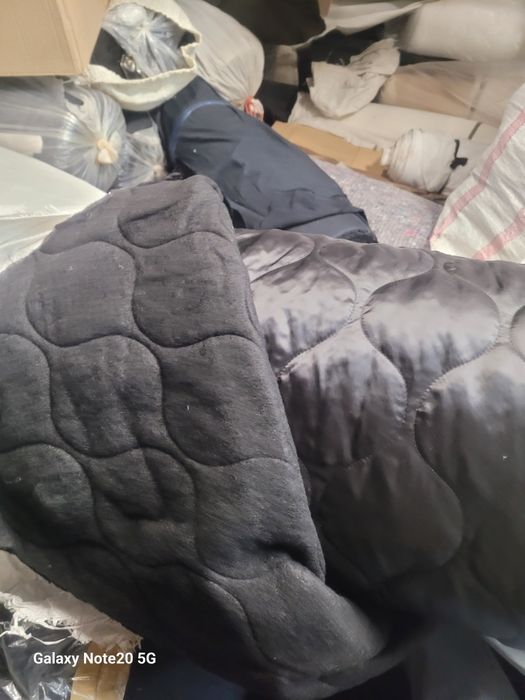 Тканина стьобана на холлофайбері.