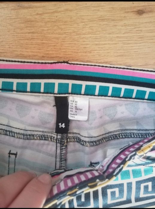 Spodnie wzorzyste kolorowe azteckie wzory H&M