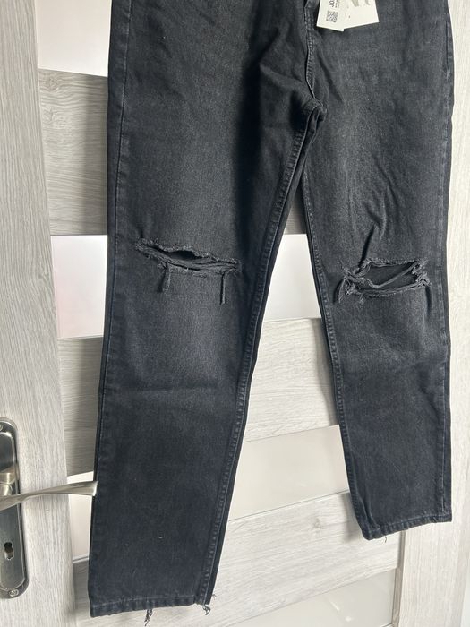 Spodnie jeansowe z przetarciami zara m