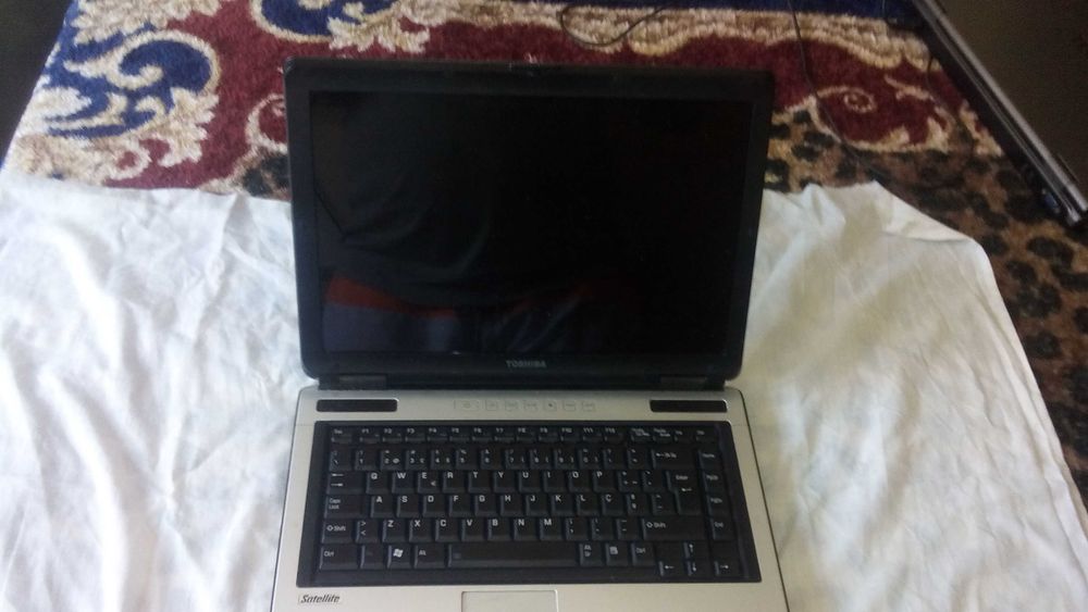 LAPTOP TOSHIBA com problemas64739968640259121