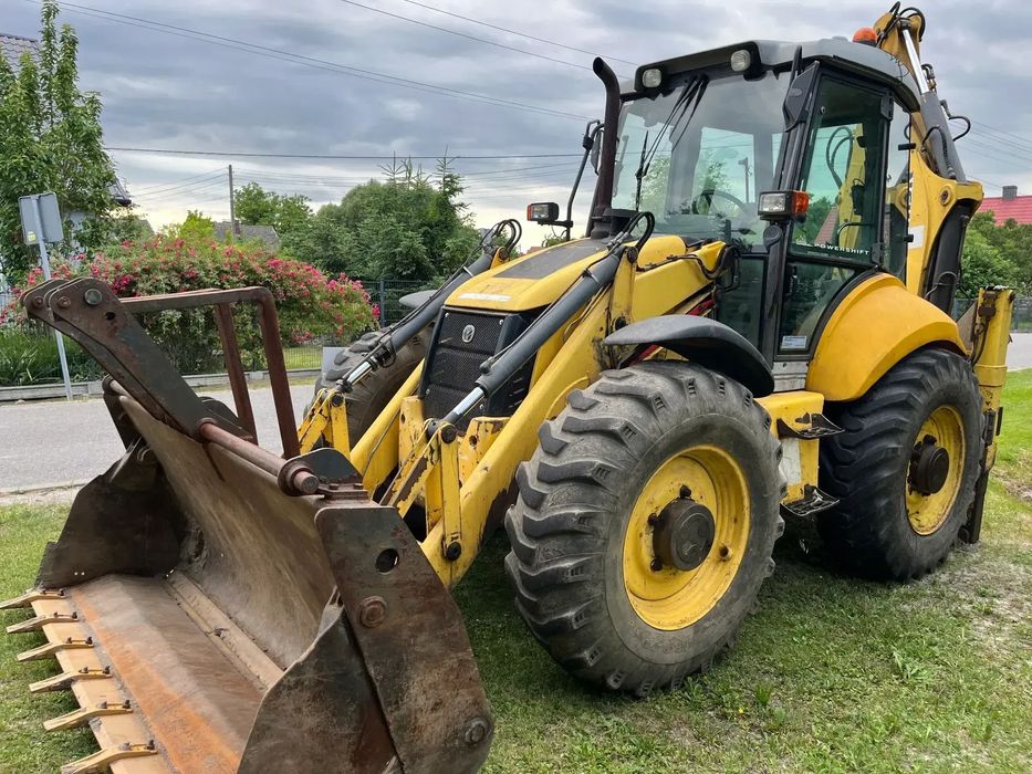 New Holland B115B N08  NEW HOLLAND B115B N08 po gruntowym serwisie