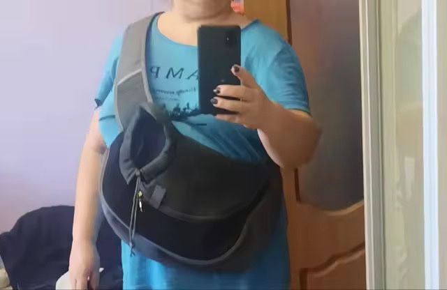 Перенесення слінг S для маленьких собак та кішок через плече на змійці