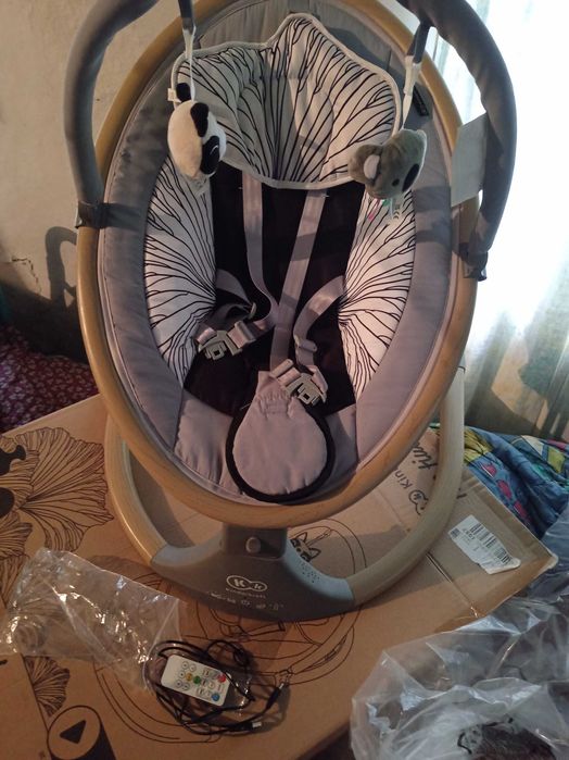 Крісло гойдалка дитяча, заколисуючий центр