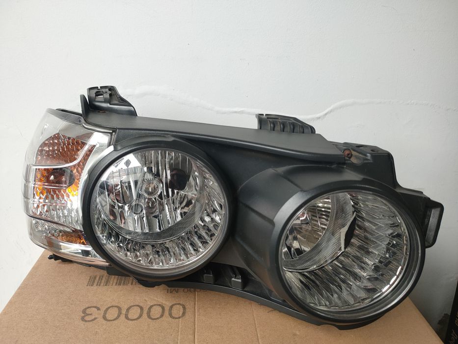 Farol ESQ e DRT CHEVROLET AVEO Hatchback (T300)