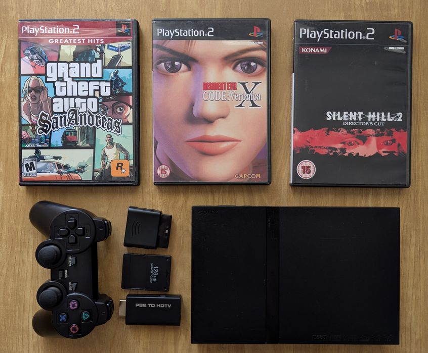 PlayStation 2 Slim + 3 gry