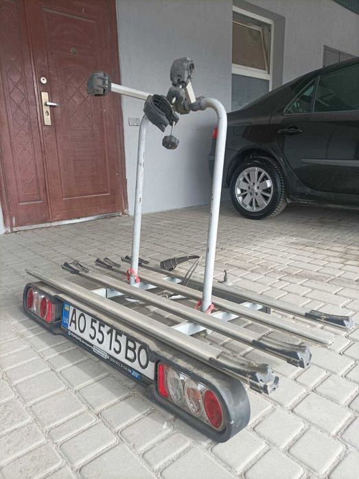 Кріплення для 4 велосипедів на фаркоп Menabo Race 4