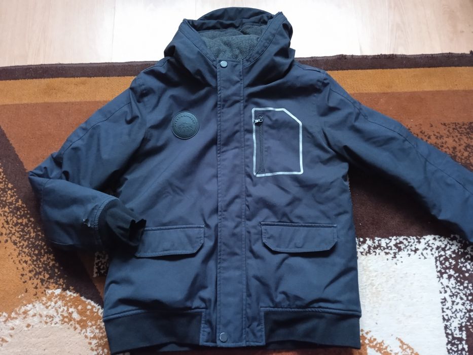 Uszkodzona kurtka zimowa Hugo Boss dla chłopca 12 lat