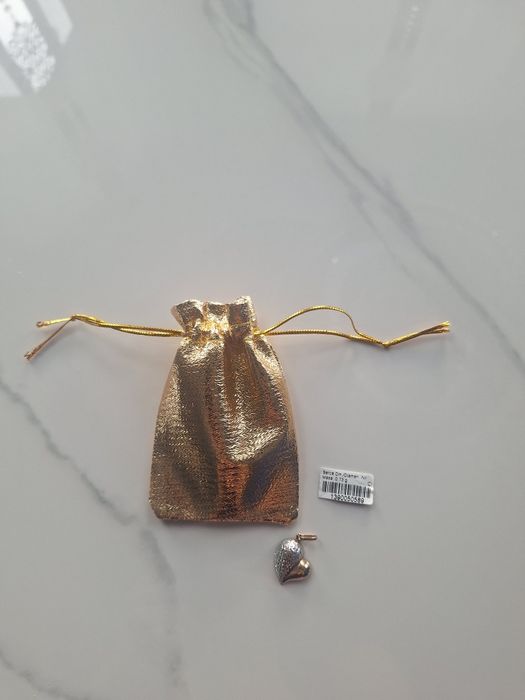 Złota zawieszka serce 333 diamentowane nacinane