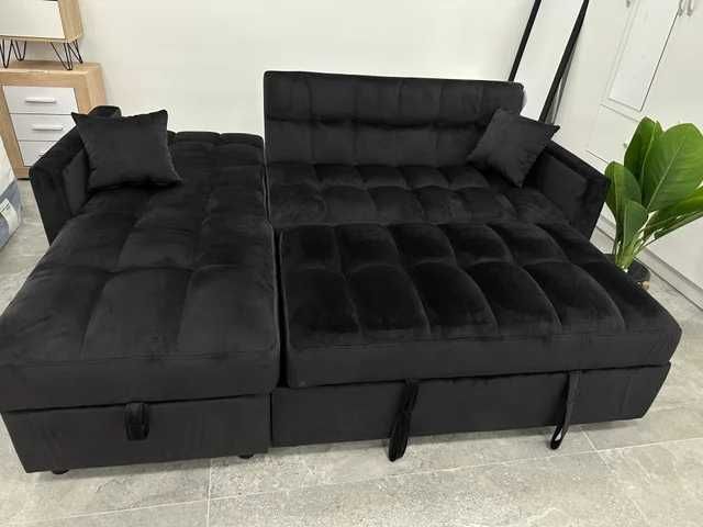 sofá-cama preto de veludo com espaço de arrumação
