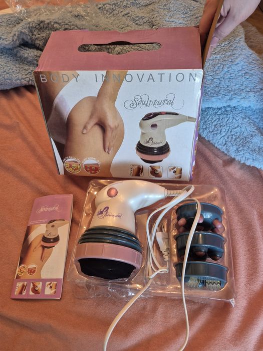 Компактний масажер