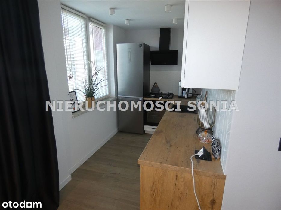 Balkon na wysokim parterze ul.1000Lecia
