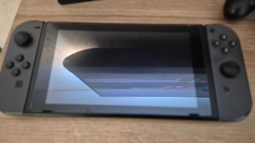 Nintendo Switch V2 + 8 gier