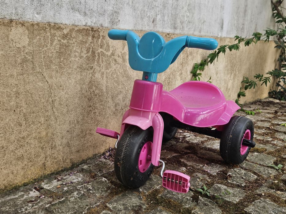 Triciclo de menina