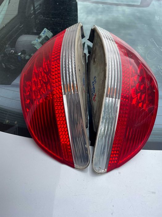 Bmw 7 e65 przed LIFT lampa lewy prawy tył w błotnik biały kierunek