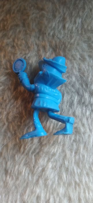 Boneco monocromático antigo