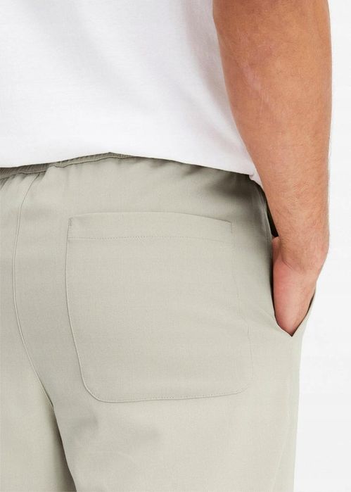 B.P.C męskie spodnie piaskowe proste r.52