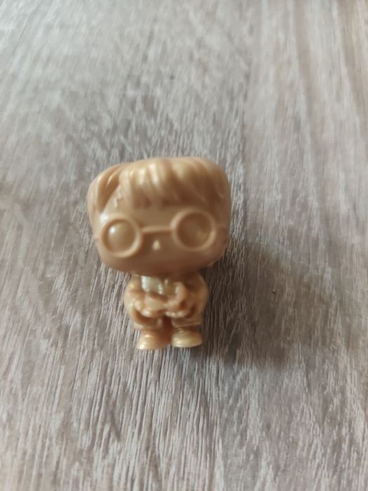Złota figurka Harrego Pottera