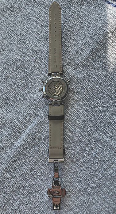 rousseau wristwatch day/date, month indicator, self-winding, water-resistant, gmt work great