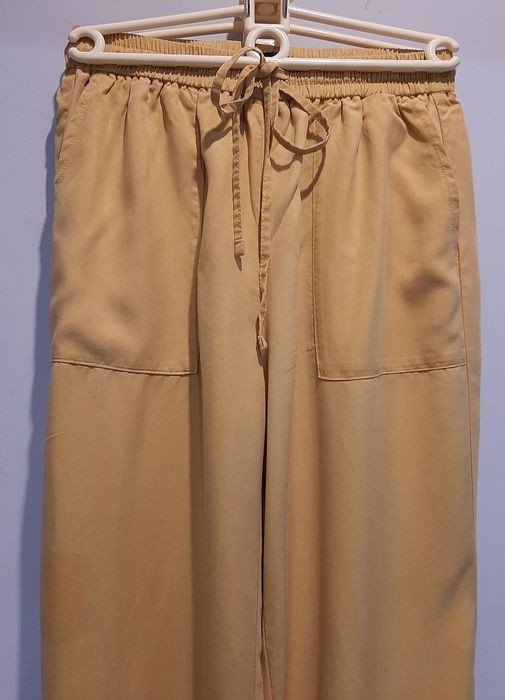 Żółte przewiewne spodnie r.XS