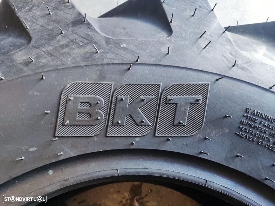 2 pneus novos 12.5/80r18 bkt rectroescavadora - oferta dos portes